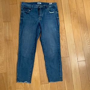 Relaxed jeans; slightly distressed. Size 8